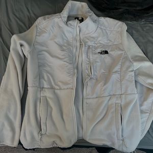 All White North Face Fleece Jacket Condition is perfect Very comfy and trendy.